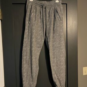 Polyester/spandex gray joggers with zip pockets